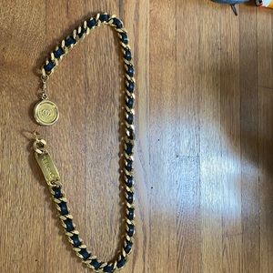 Chanel gold link + leather belt.